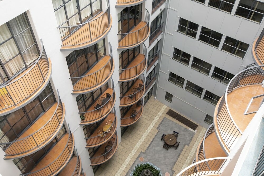 Фото Quest Atrium Serviced Apartments