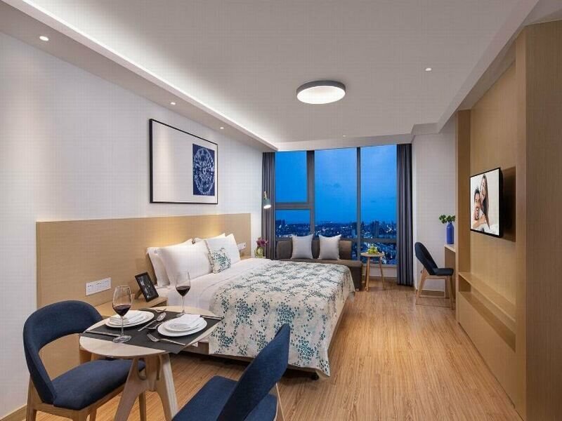 Фото Joysuites Nantong