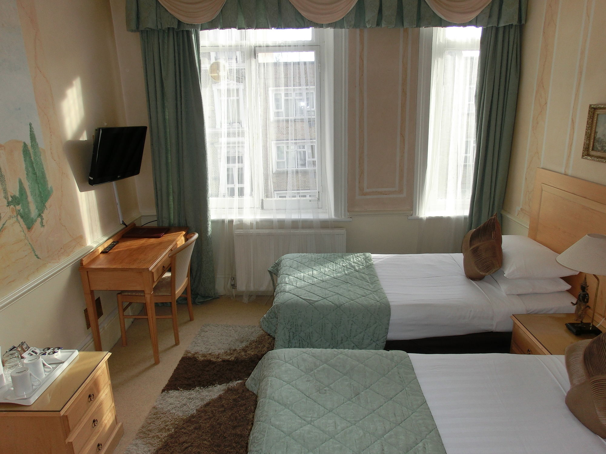 Фото Rushmore Hotel