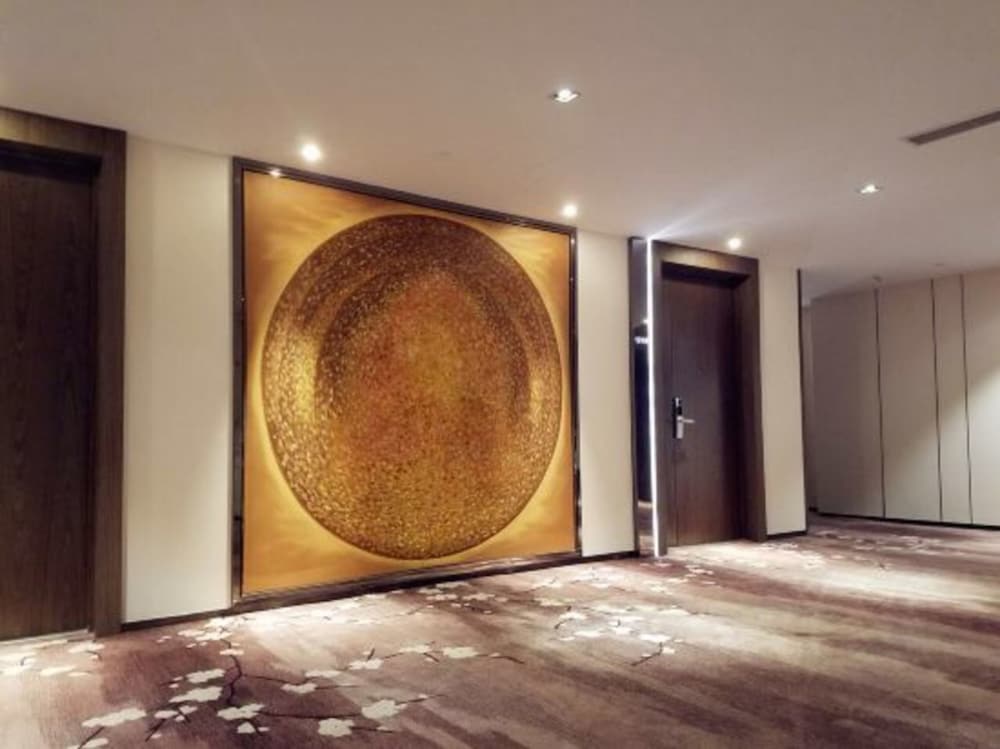 Фото Suzhou Hupan Four Seasons Apartment