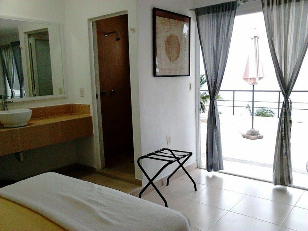 Фото Donde Mira El Sol Tu Casa SPA Resort EN Acapulco