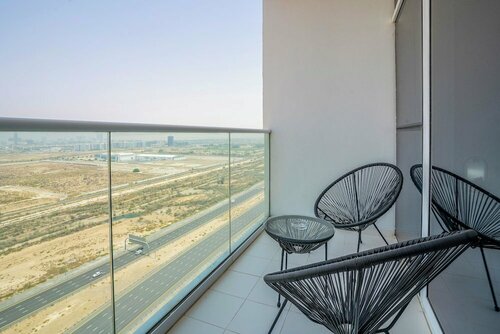 Апартаменты Tanin - Sleek Studio Offering Unobstructed City Views в Дубае