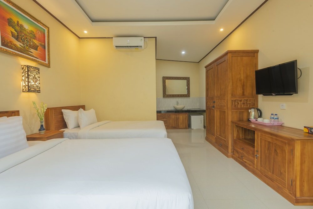 Фото Liliy Guest House Legian
