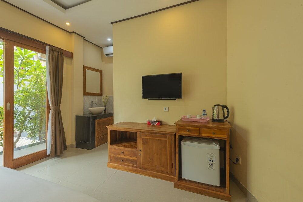 Фото Liliy Guest House Legian