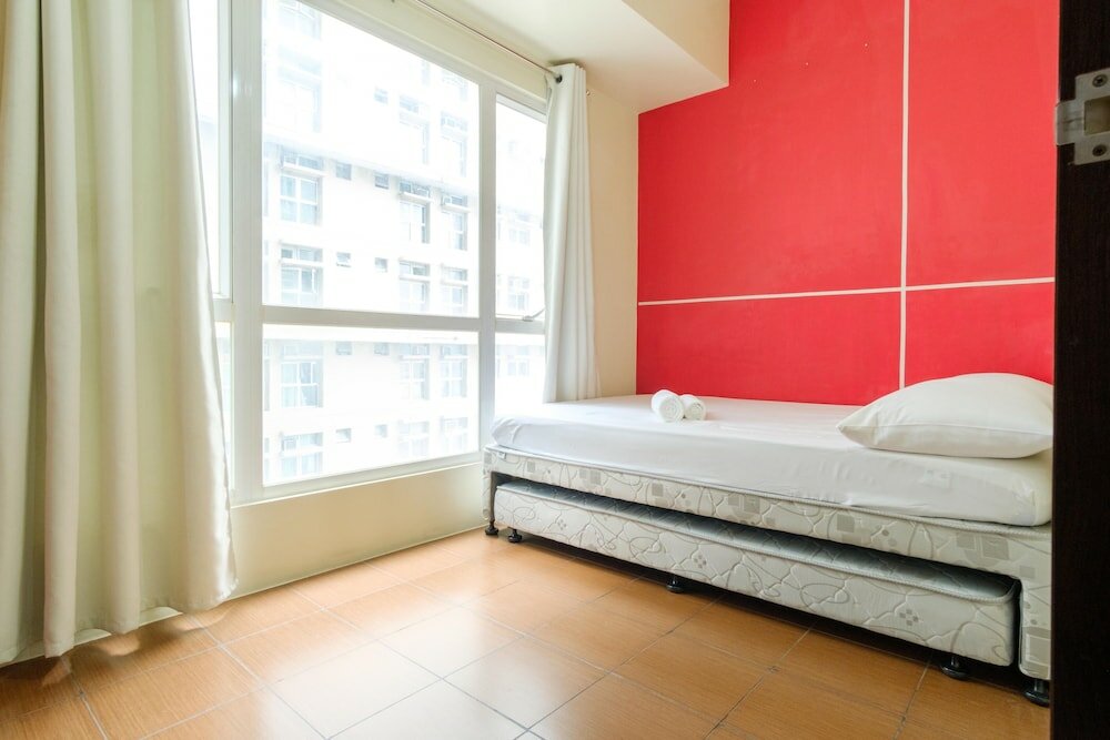 Фото Reddoorz Plus @ Pioneer Woodlands Mandaluyong