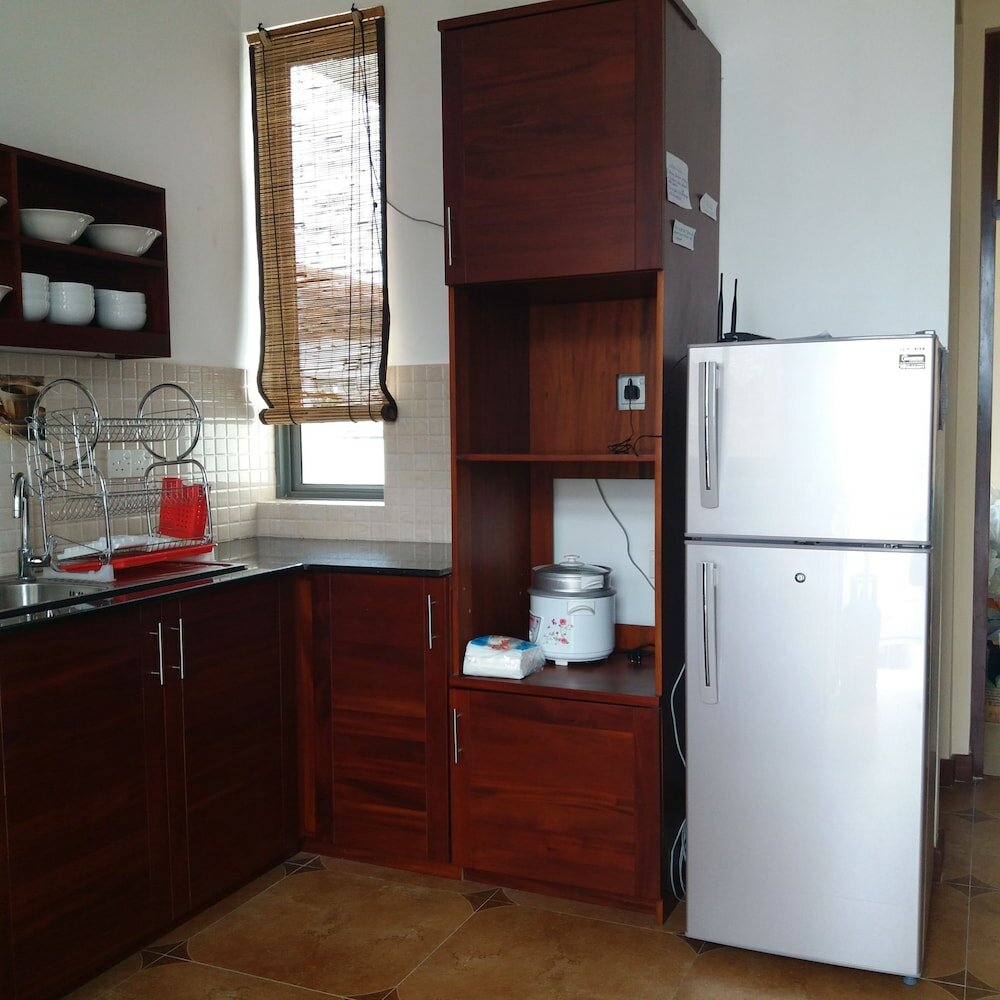 Фото Tj's Apartments