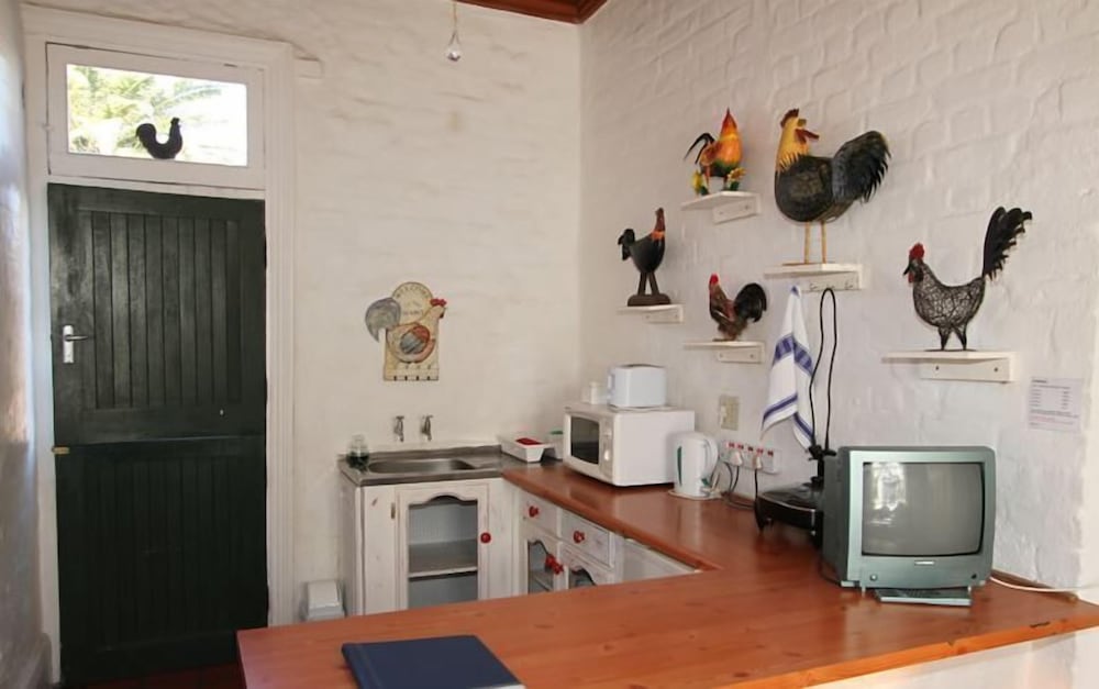 Фото Buiten Verwagten Guest House