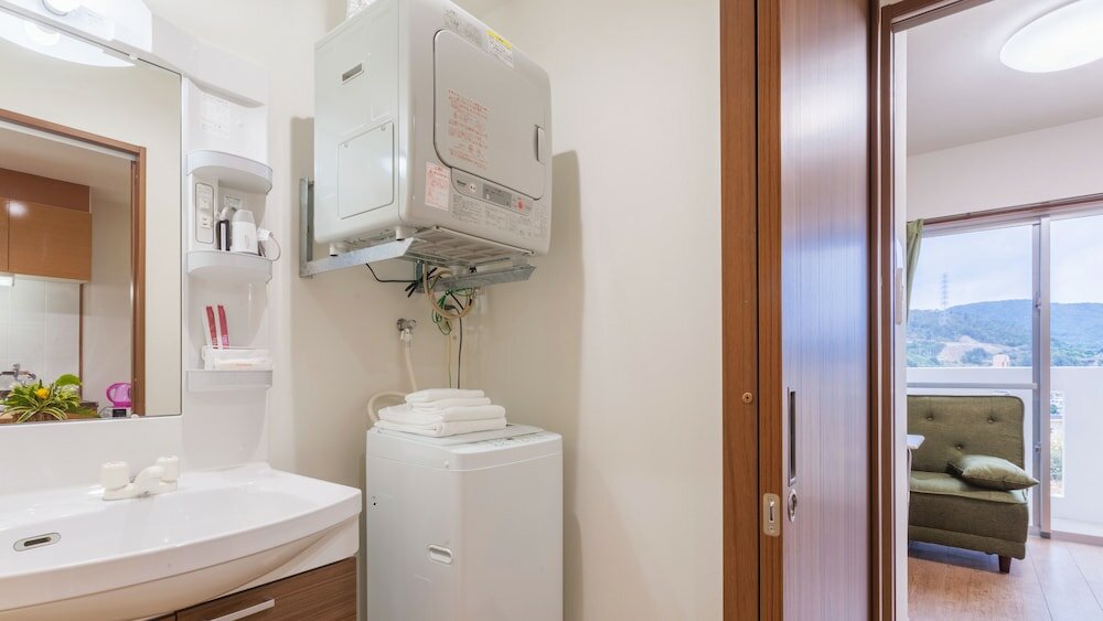 Фото Kariyushi Condominium Resort Kin Yaka Seaside