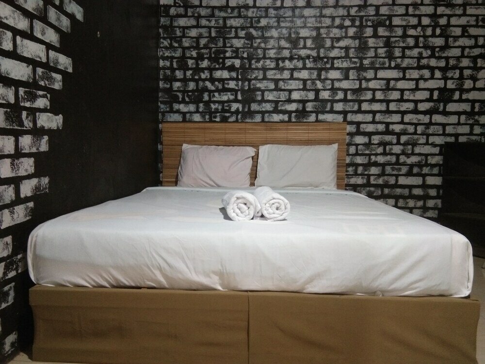 Фото Penginapan Bunar Tunggal