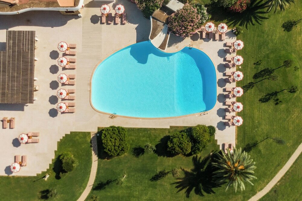 Фото Курортный отель Is Molas Resort