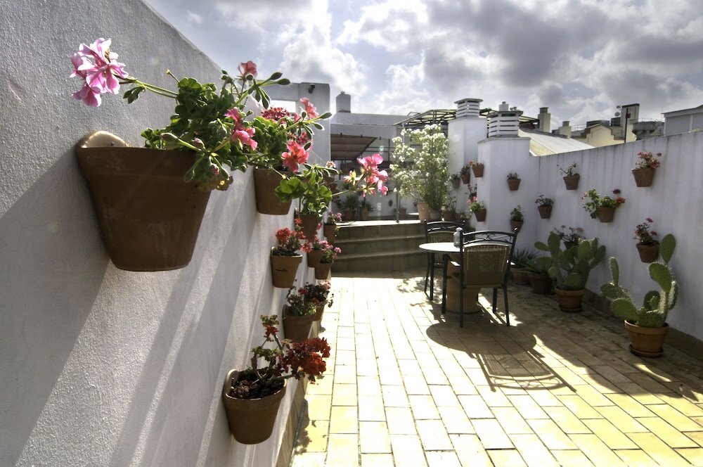 Фото Hotel Un Patio al Sur