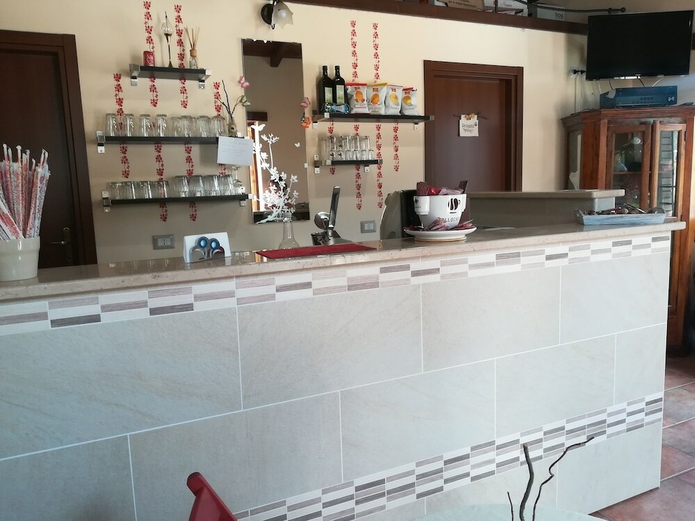 Фото Agriturismo i Tre Ulivi