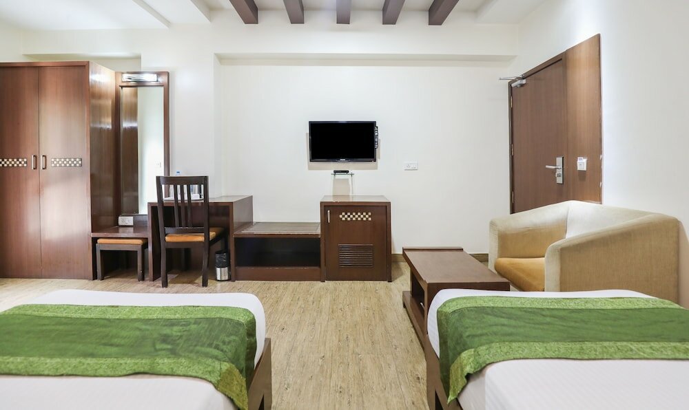 Фото Treebo Select Grand Premier Suites