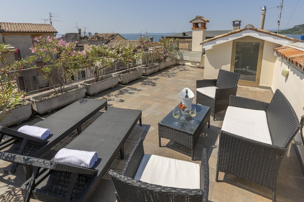 Фото Corte Realdi Boutique Rooms Garda