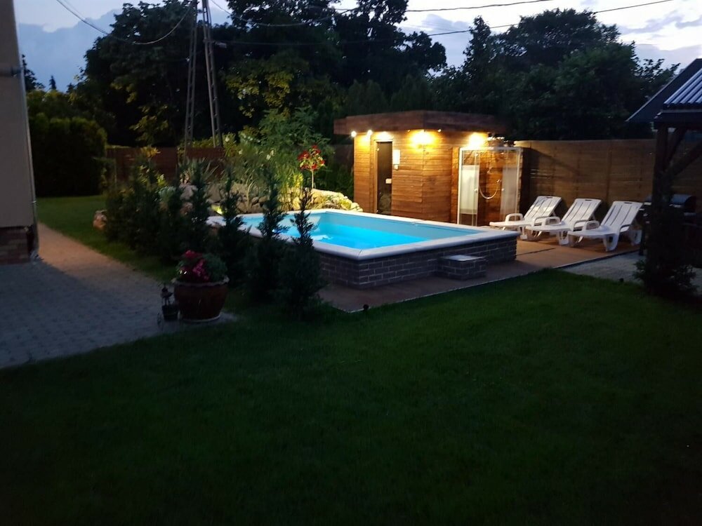 Фото Sunrise Apartmanház