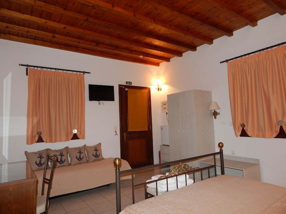 Фото Tinos Suites & Apartments