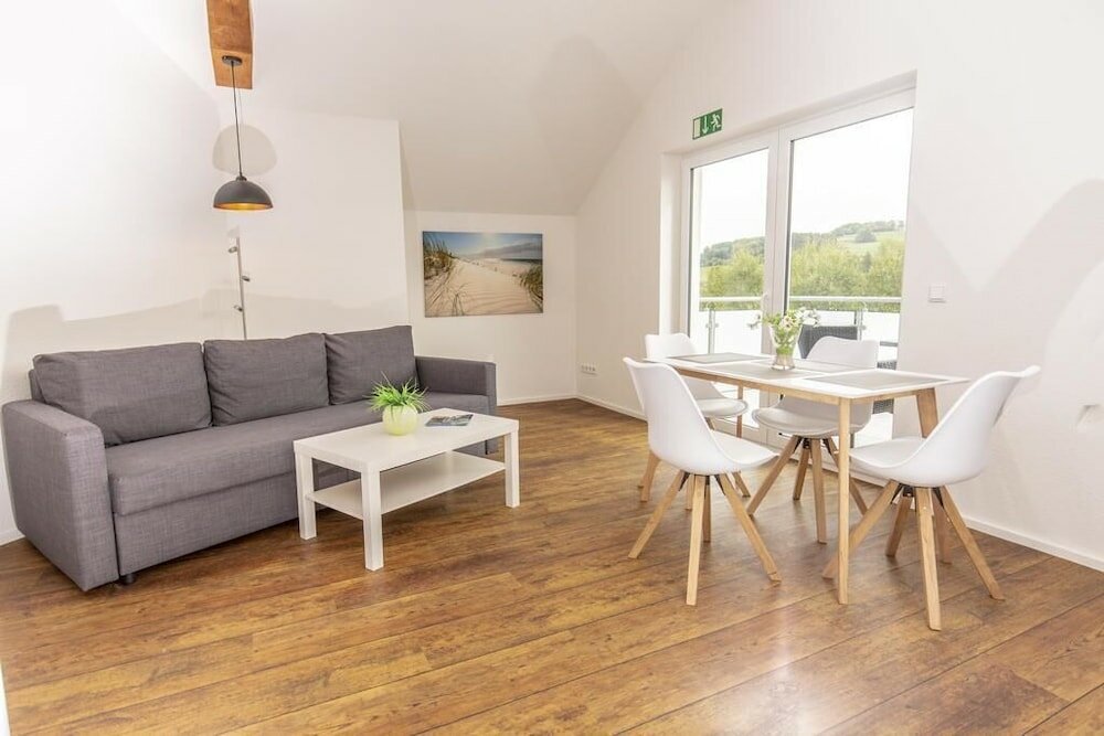 Фото Ferienwohnungen Am Mühlenberg