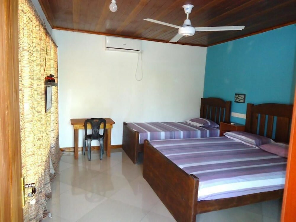 Фото New Green Hut Inn & Restaurant