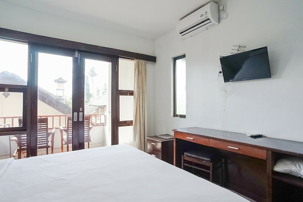 Фото Indopurejoy House - Komala Indah Cottages