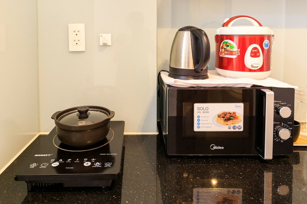 Фото Oyo 103 Airport Family Apartment