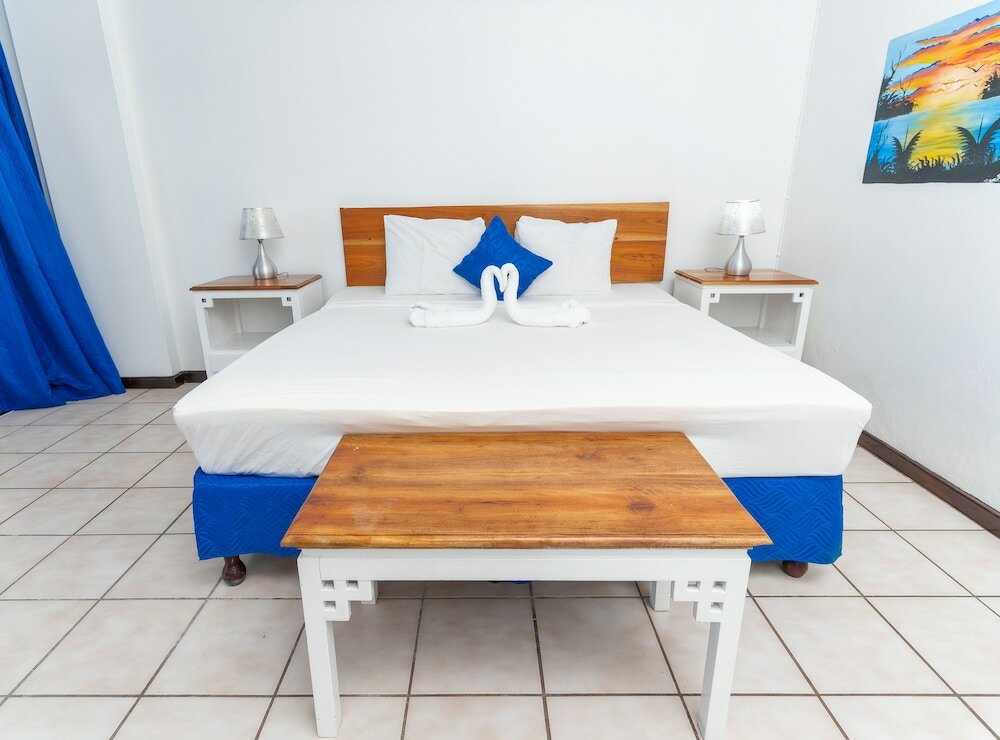 Фото Sand And Tan Beach Hotel