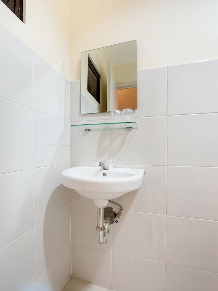 Фото Oyo 490 V-cat Apartelle