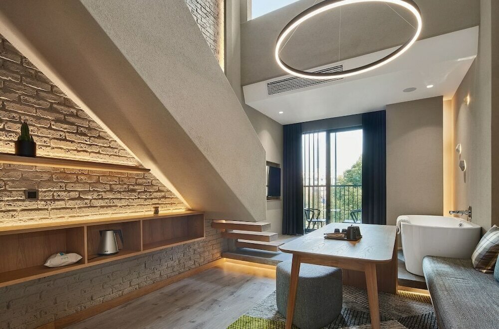 Фото Ebo Hotel Hangzhou Wulinmen