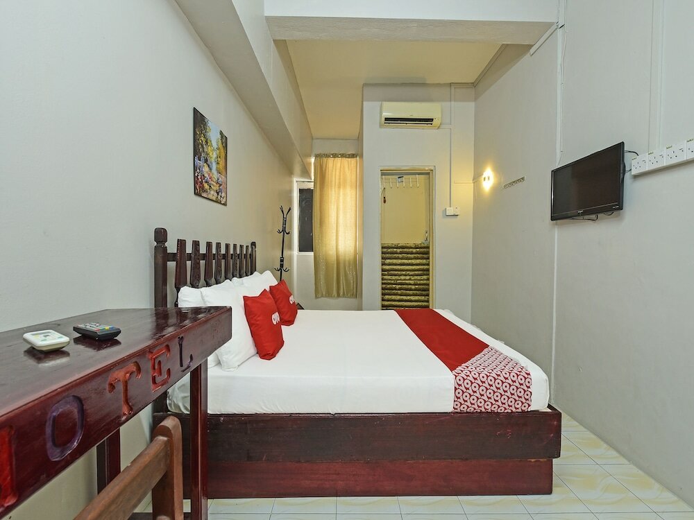 Фото Super Oyo Capital O 90659 Raintown Timbers Hotel