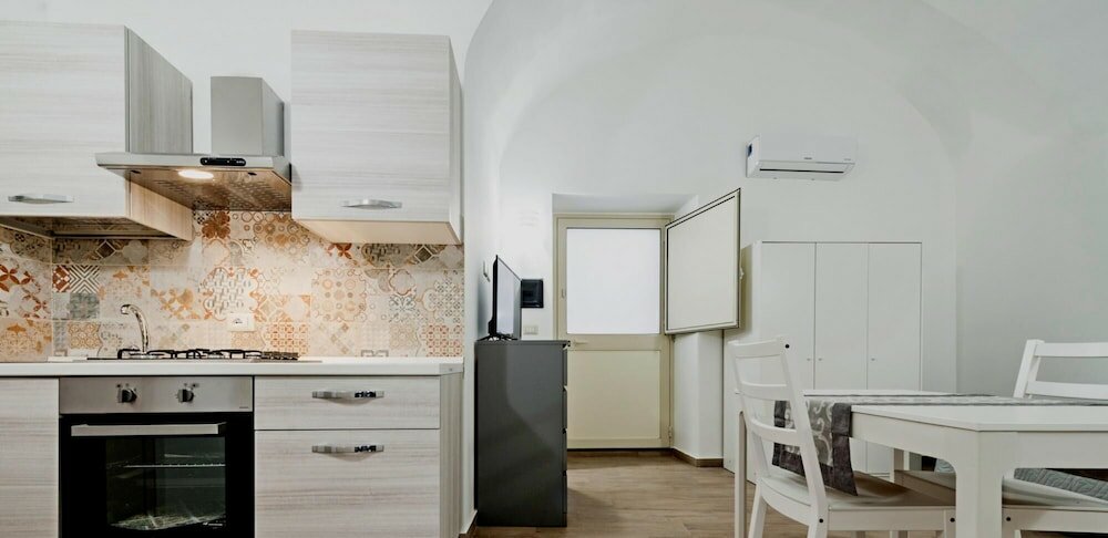 Фото Trinità 57 Apartments