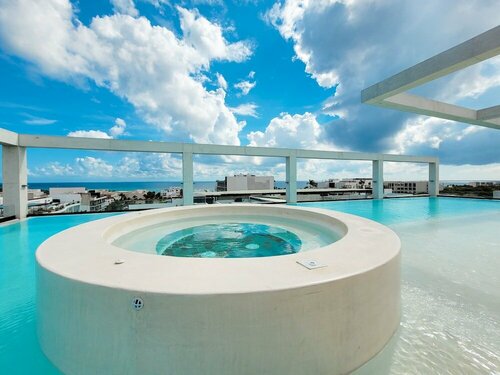Гостиница Ceren Luxury Apartments by Spot Rentals в Плая-дель-Кармен