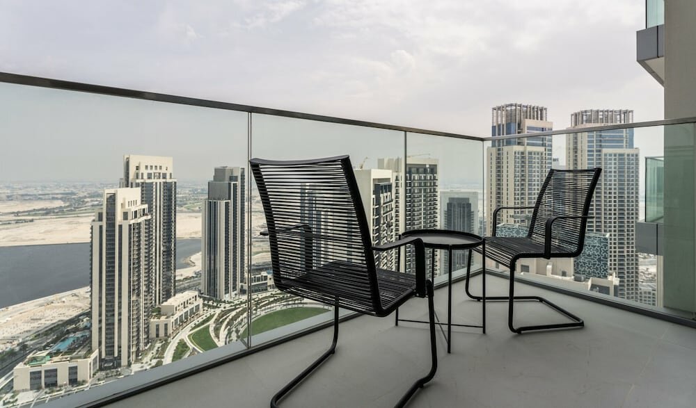 Short-term housing rental Aya - Elegant 1br Apartment With Balcony and Creek Views, Dubai, photo