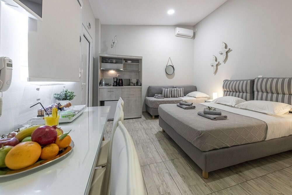 Фото Comfort Stay Airport Studios - Free shuttle from the Athens Airport