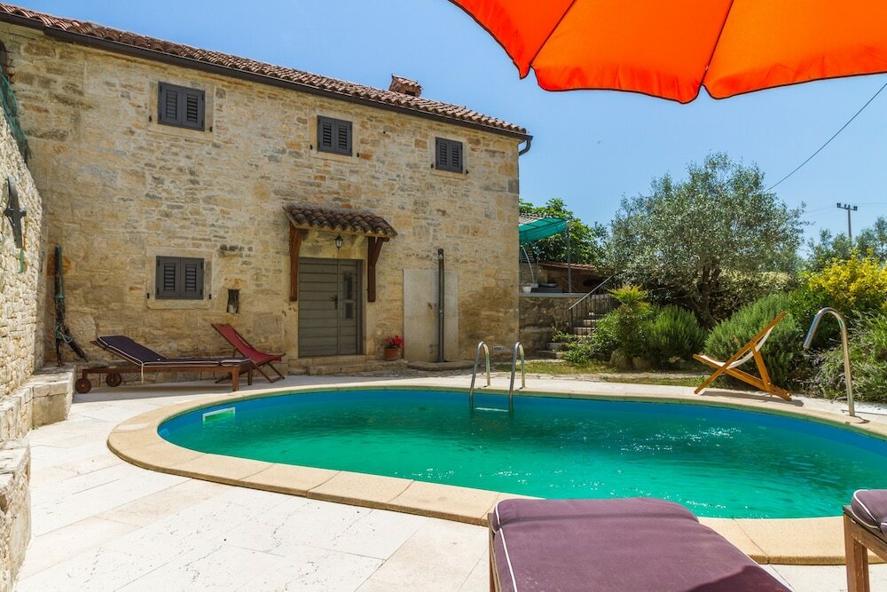 Фото Especially charm stone house with a pool