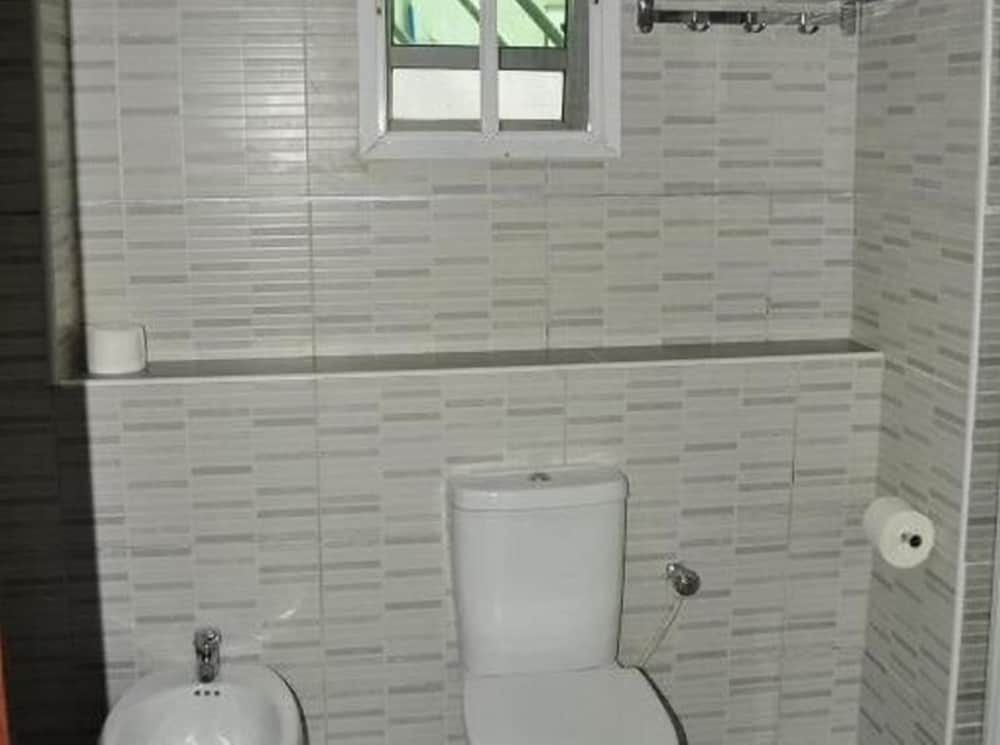 Фото De Brass Suites Hotel