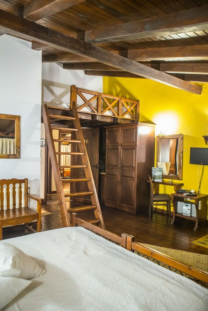 Фото Oikoperiigitis Hotel