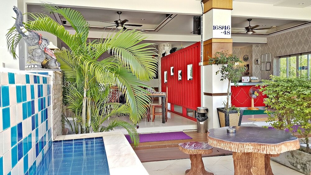 Фото Green Harbor Hotel & Service Apartment