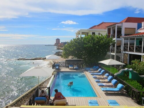 Гостиница Scuba Lodge & Ocean Suites
