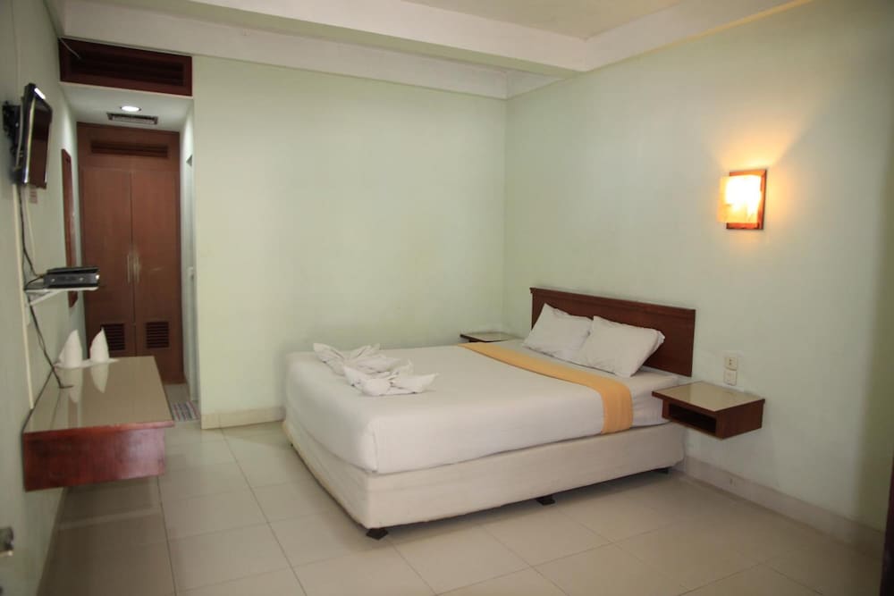 Фото Pandu Lakeside Hotel Parapat - Toba Lake