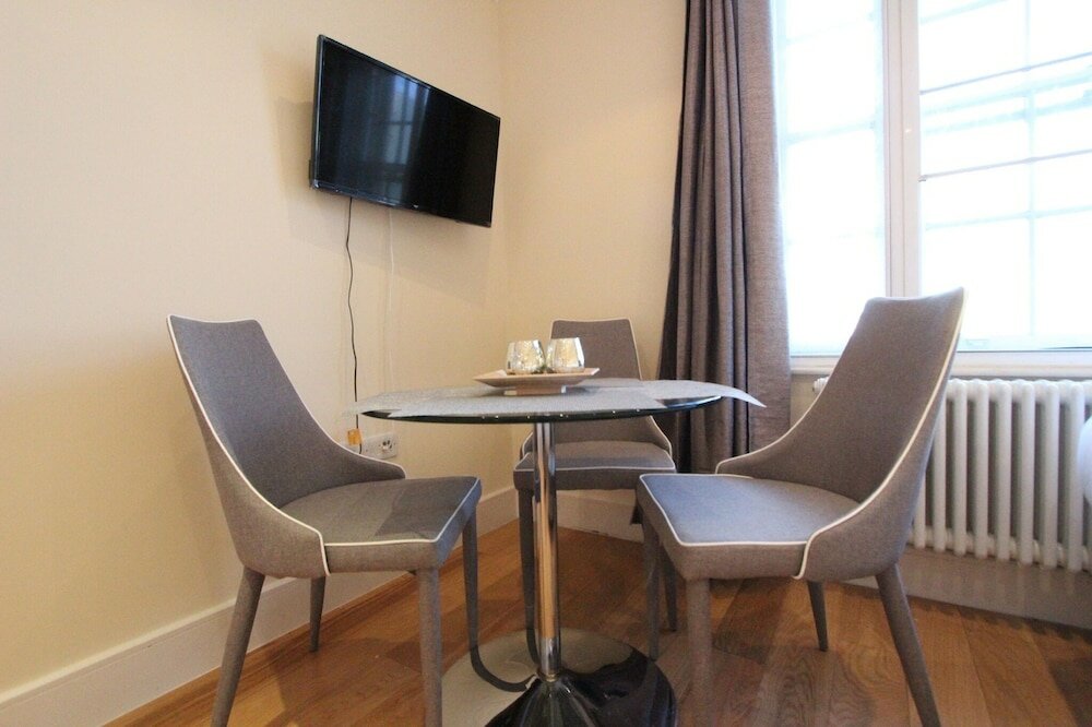 Фото Cosy Central Apartments - Oxford Street