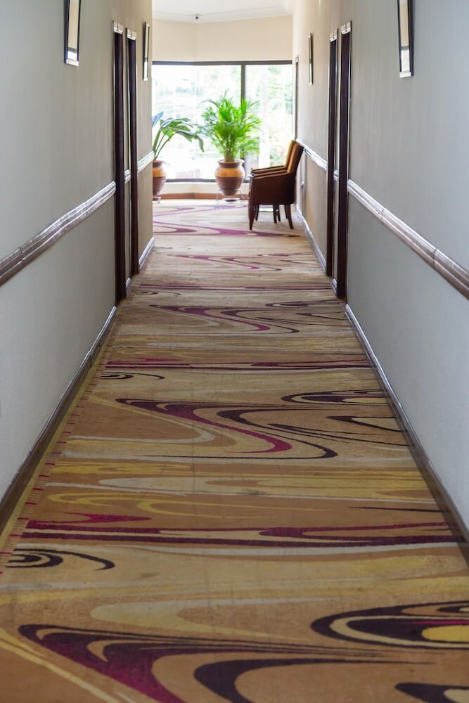 Фото Sunlodge Hotel