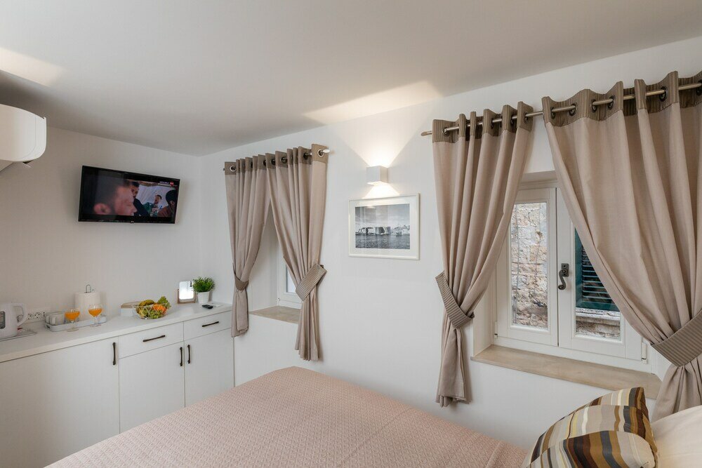 Фото Lausion Apartments