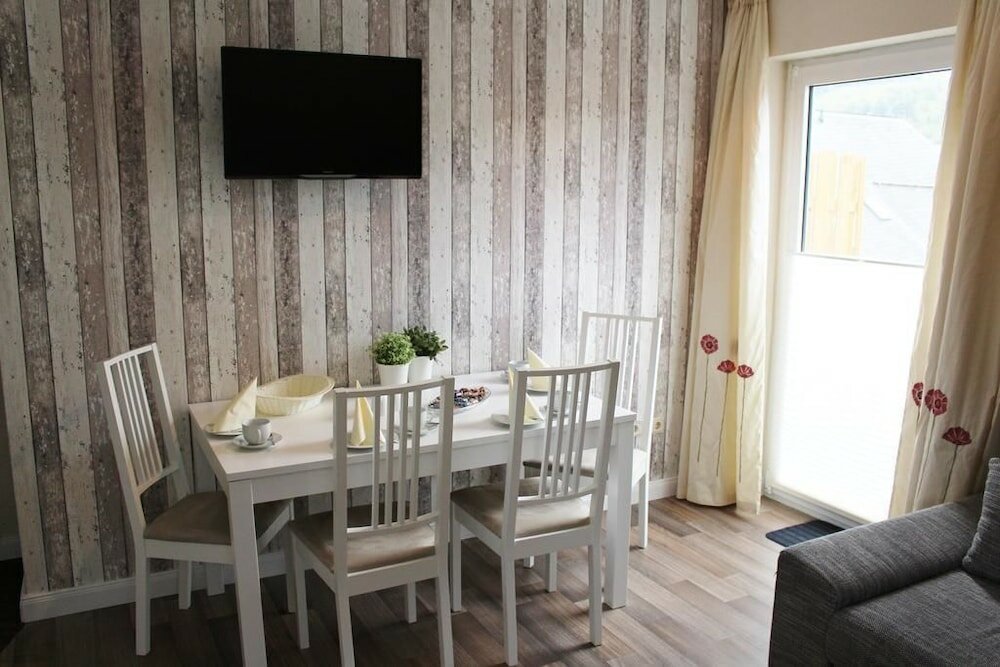 Фото Löwenstein Ferienwohnungen