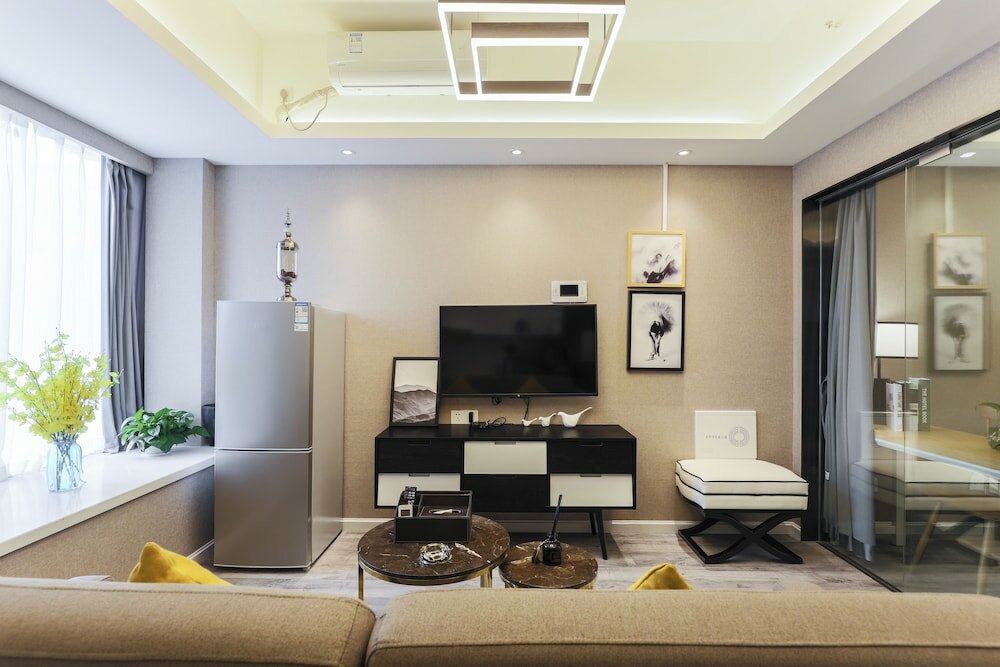 Фото Yue Qi Hotel Apartment