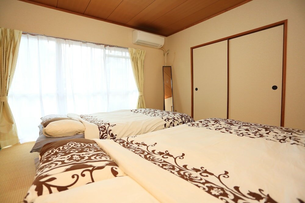 Фото Dotonbori Riverside Apartment