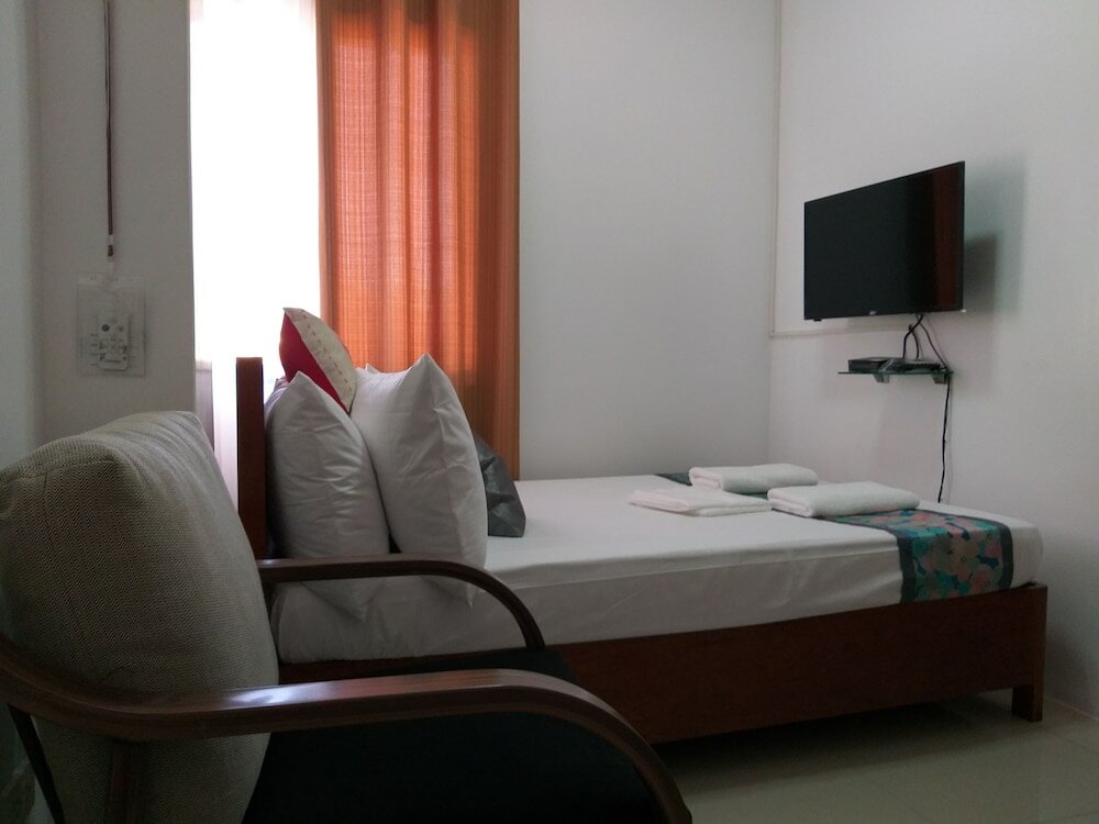 Фото Lighthouse Apartment and Guest Inn