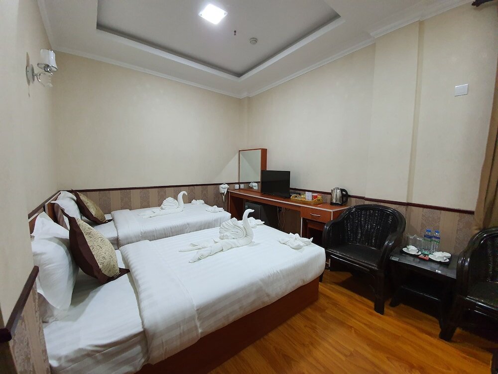 Фото Shwe Pe Ti Hotel