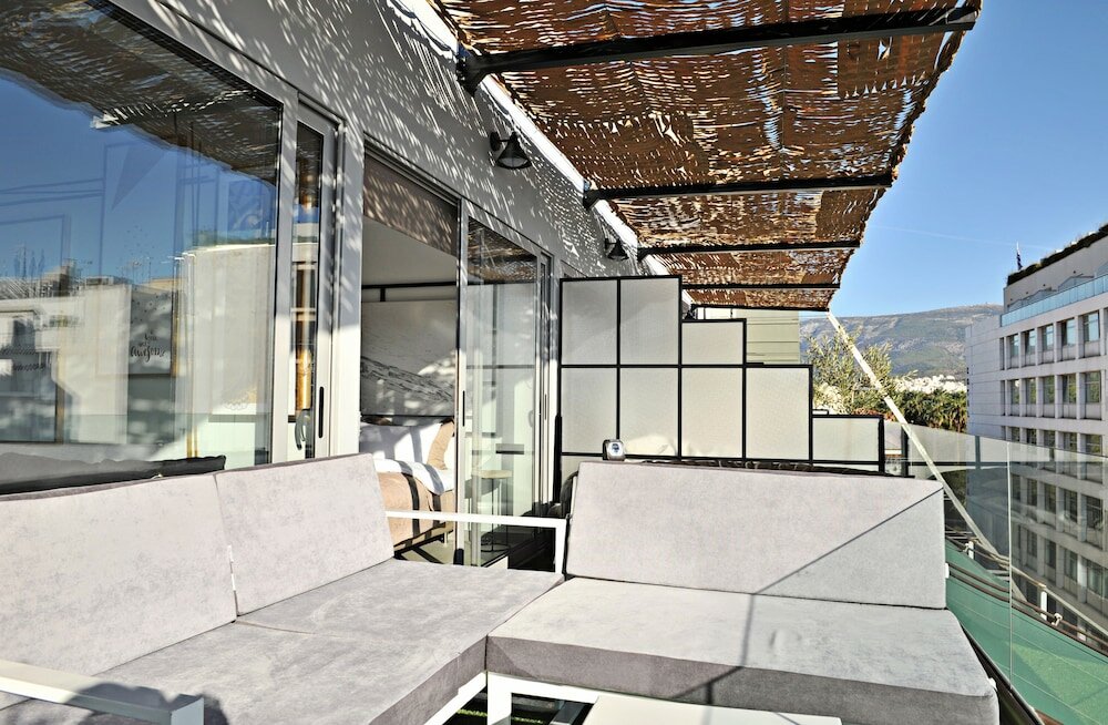 Фото The Athenians Art Apartments