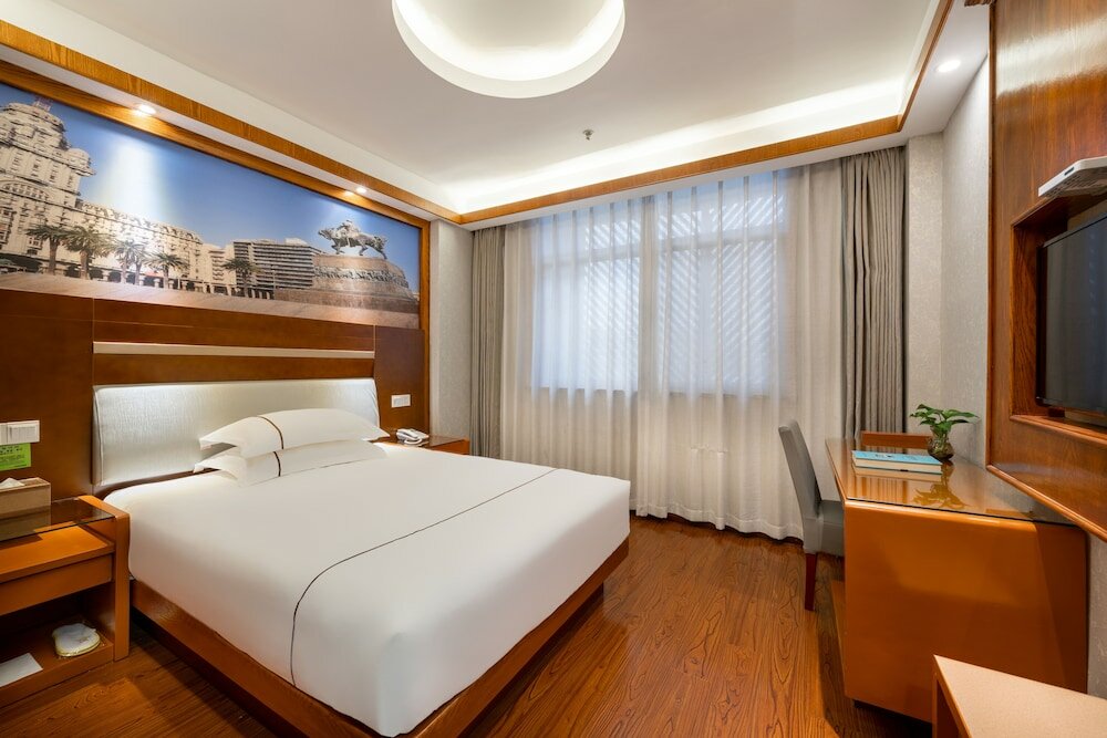 Фото Yiwu Baide Theme Hotel