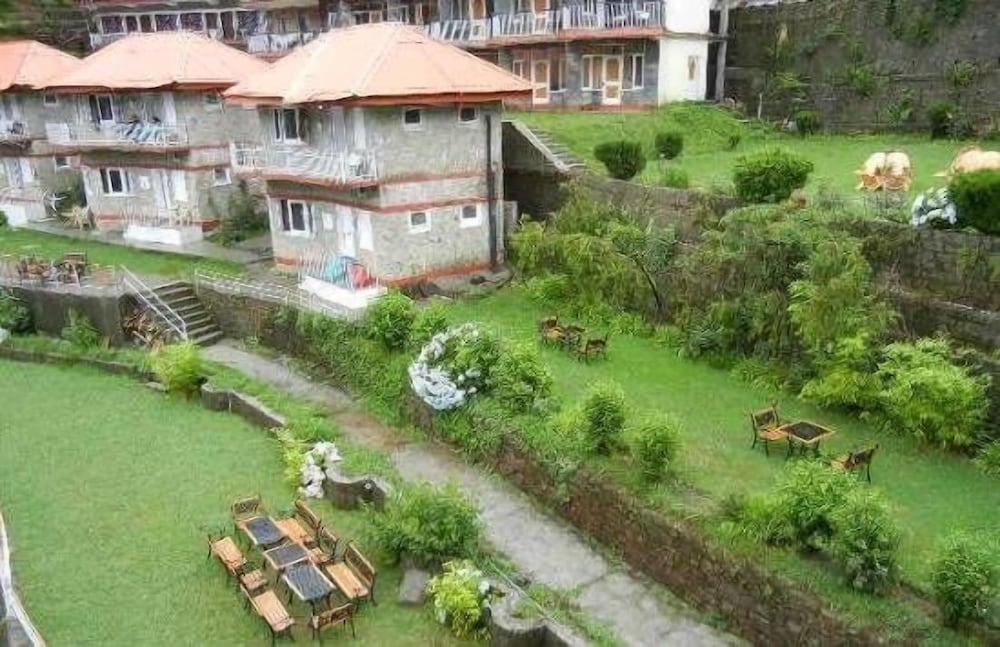 Фото Hotel Dev Cottage