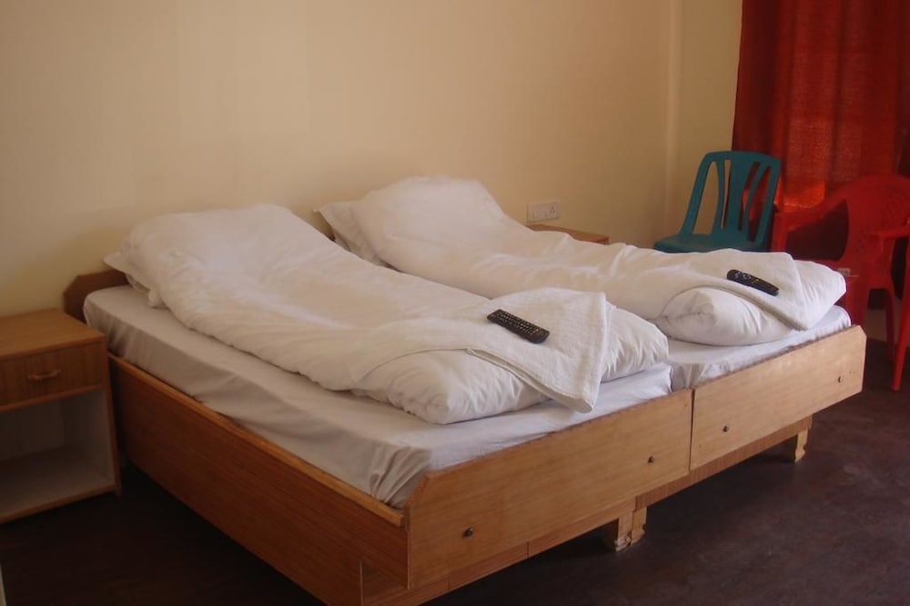 Фото Kanda Lha Guesthouse